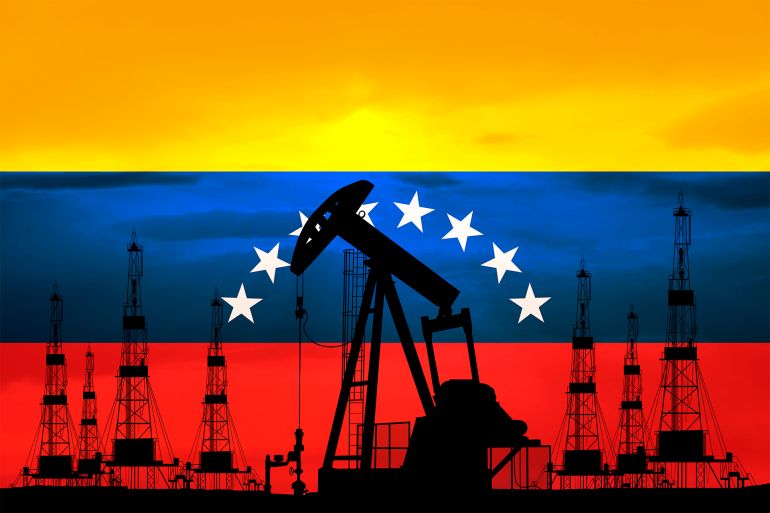 Oil rigs on the background of Venezuela flag - stock photo
