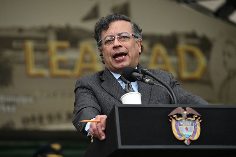(FILES) Colombia's President Gustavo Petro delivers a speech in front of Colombia's new Minister of Defense, General Pedro Sanchez (out of frame), during a troop recognition ceremony at the Jose Maria Cordova Military Cadet School in Bogota on March 11, 2025.