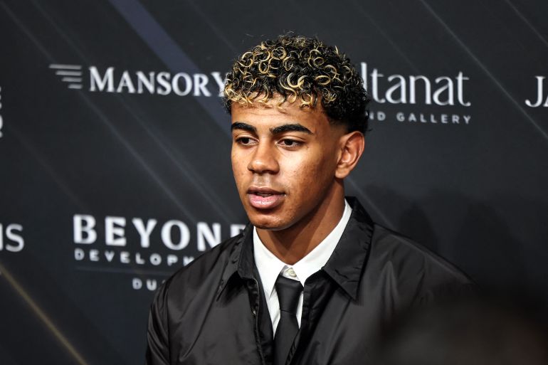 Spanish footballer Lamine Yamal arrives for the Globe Soccer Awards ceremony in Dubai on December 28, 2025.