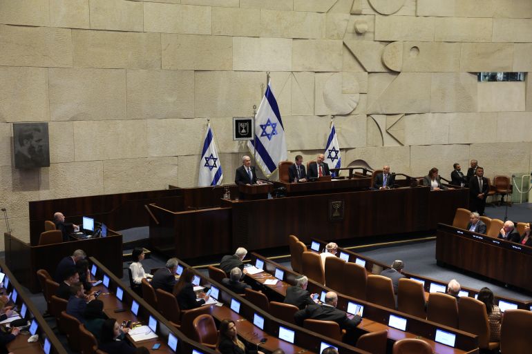 epa12467715 Israeli Prime Minister Benjamin Netanyahu (C) delivers a speech at the opening of the winter session of the Israeli parliament, Knesset, in Jerusalem, 20 October 2025. EPA/ABIR SULTAN