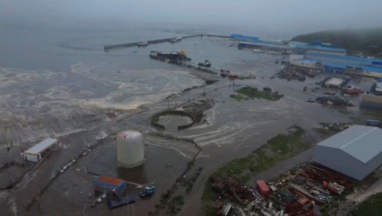 Tsunami waves flood an area after a powerful magnitude 8.8 earthquake struck off Russia's far eastern Kamchatka Peninsula, in Severo-Kurilsk, Sakhalin Region, Russia, July 30, 2025, in this still image taken from video.