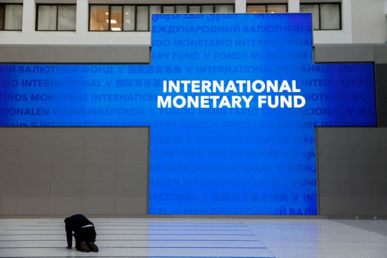FILE PHOTO: The IMF before the arrival of Ukraine's President Volodymyr Zelenskiy and International Monetary Fund Managing Director Kristalina Georgieva in Washington, U.S., December 11, 2023. REUTERS/Julia Nikhinson/File Photo