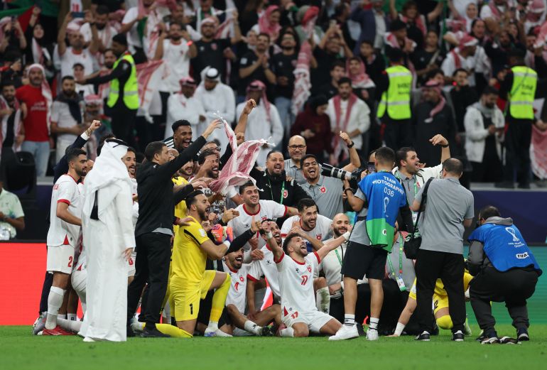 Soccer Football - FIFA Arab Cup - Qatar 2025 - Semi Final - Jordan v Saudi Arabia - Al Bayt Stadium, Al Khor, Qatar - December 15, 2025 Jordan pose for a team group photo after winning the match