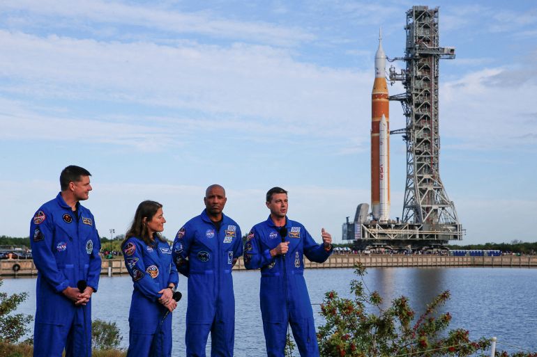 Artemis II mission's Commander Reid Wiseman speaks next to pilot Victor Glover, mission specialists Christina Koch and Jeremy Hansen during the rollout of NASA's next-generation moon rocket, the Space Launch System (SLS) rocket with the Orion crew capsule, to the launch pad at the Kennedy Space Center in Cape Canaveral, Florida, U.S., January 17, 2026. Launch around the moon and back is scheduled for no earlier than February 6, 2026. REUTERS/Joe Skipper REFILE-QUALITY REPEAT TPX IMAGES OF THE DAY