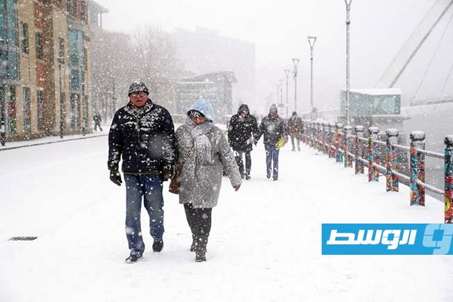 Snow covers streets and cities in Europe.