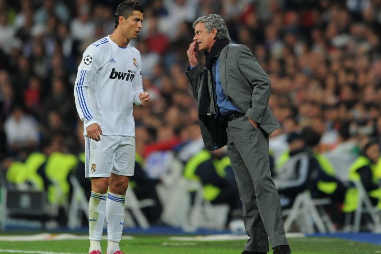MADRID, SPAIN - OCTOBER 19: Head Coach Jose Mourinho (R) of Real Madrid instructs Cristiano Ronaldo during the UEFA Champions League group G match between Real Madrid and AC Milan at the Estadio Santiago Bernabeu on October 19, 2010 in Madrid, Spain. (Photo by Jasper Juinen/Getty Images)