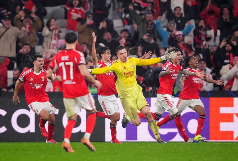 LISBON, PORTUGAL - JANUARY 28: Anatoliy Trubin of Benfica celebrates scoring his team's fourth goal with teammates during the UEFA Champions League 2025/26 League Phase MD8 match between SL Benfica and Real Madrid C.F. at Estadio do SL Benfica on January 28, 2026 in Lisbon, Portugal.