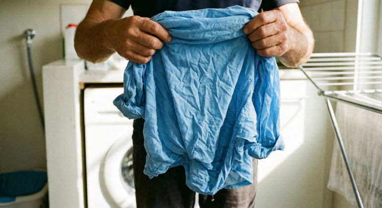 Shrunken clothes after washing - AI generated image