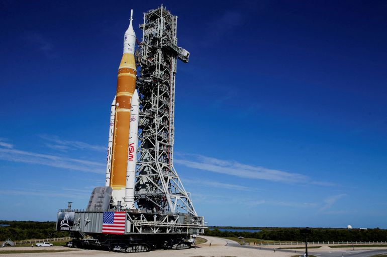 NASA's next-generation moon rocket, the Space Launch System (SLS) rocket with the Orion crew capsule, rolls to the launch pad at the Kennedy Space Center in Cape Canaveral, Florida, U.S. January 17, 2026. Launch around the moon and back is scheduled for February 6, 2026.