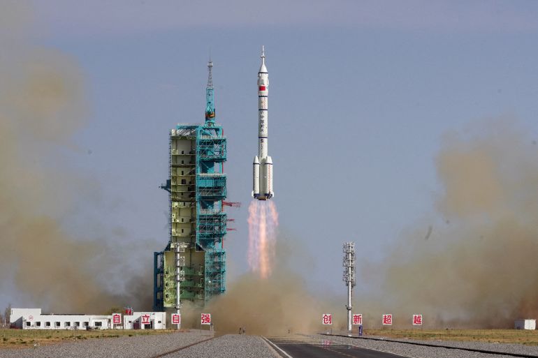 A Long March-2F rocket carrying the Shenzhou-20 spacecraft takes off from the Jiuquan Satellite Launch Center.