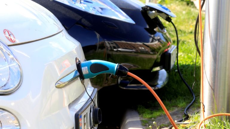 Electric cars are charged at a parking lot in Oslo, Norway, June 1, 2017.