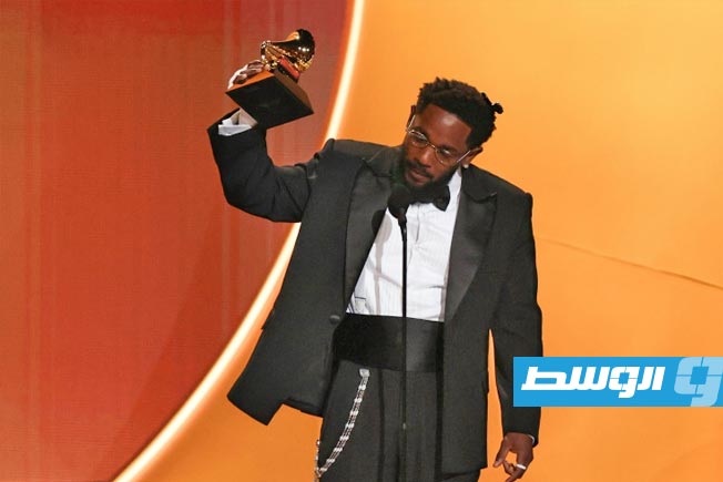 American rapper Kendrick Lamar receives a Grammy Award in Los Angeles on February 1, 2026.