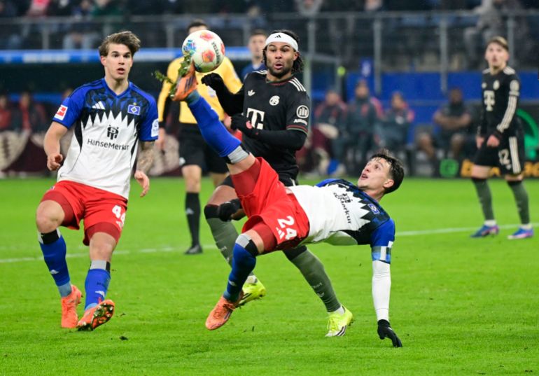 Soccer Football - Bundesliga - Hamburger SV v Bayern Munich - Volksparkstadion, Hamburg, Germany - January 31, 2026 Hamburg SV's Nicolas Capaldo in action with Bayern Munich's Serge Gnabry