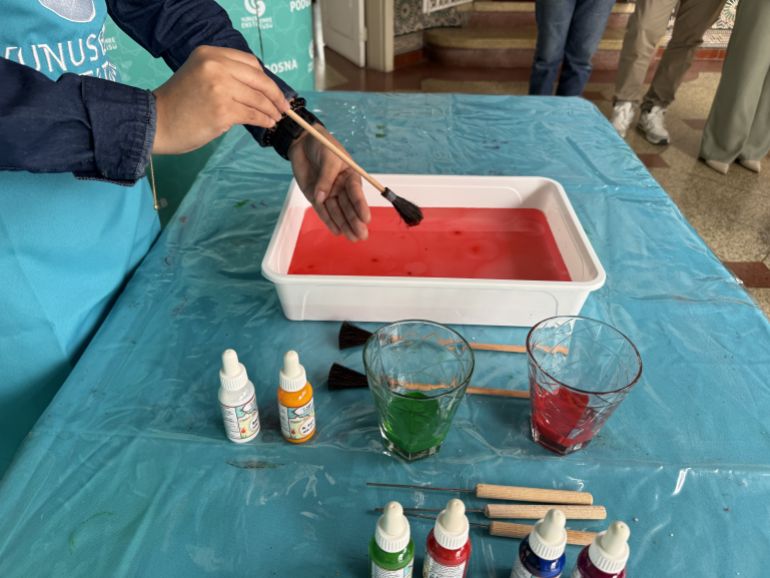 Ebru, one of the Turkish arts, involves painting on water mixed with various materials